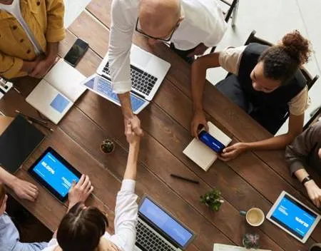 Team discussion image from the EOPAIA website